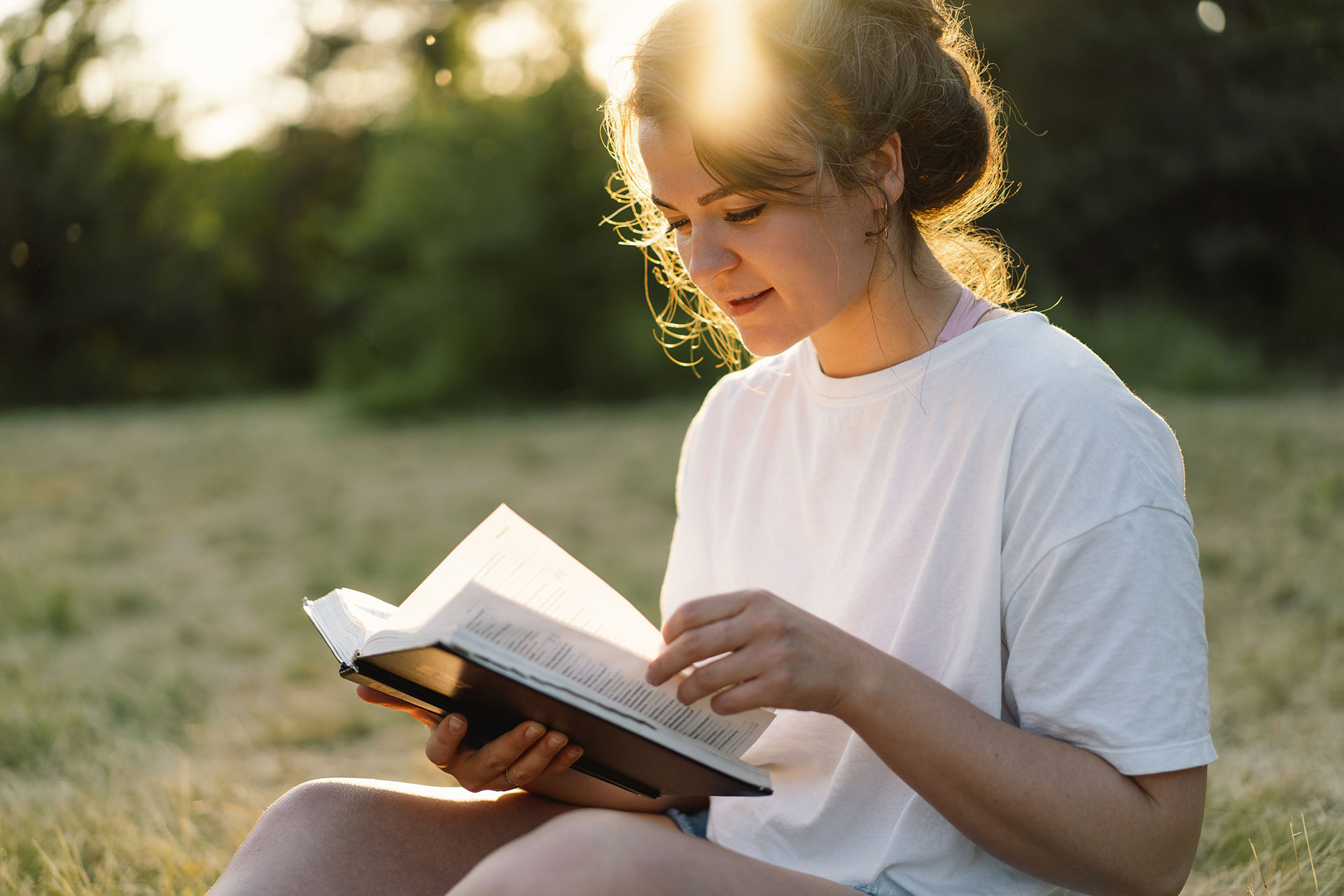 christian-woman-holds-bible-in-her-hands-2022-08-01-03-16-53-utc